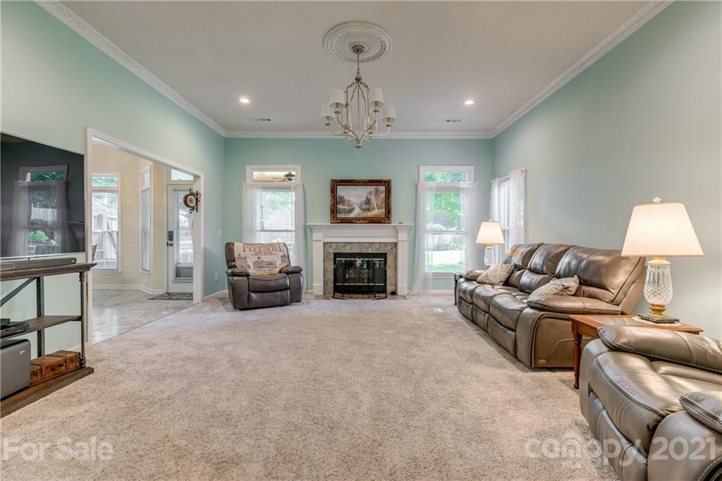 711 Monticello Drive Fort Mill, SC 29708 - Photo 7 of 45 a living room with furniture and a fireplace