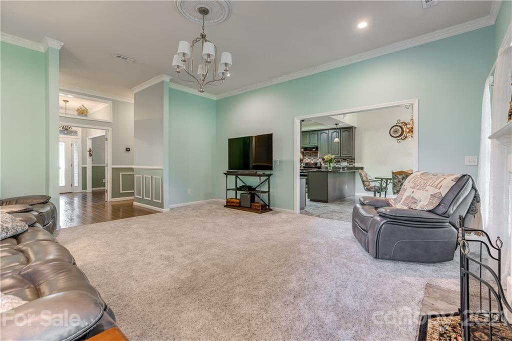 711 Monticello Drive Fort Mill, SC 29708 - Photo 9 of 45 a large bedroom with furniture and flat tv screen
