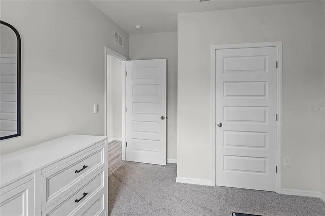 a view of an empty walk in closet