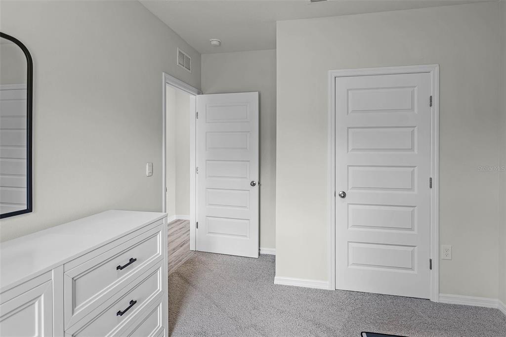 3421 Nettle Loop Tavares, FL 32778 - Photo 18 of 30 a view of an empty walk in closet