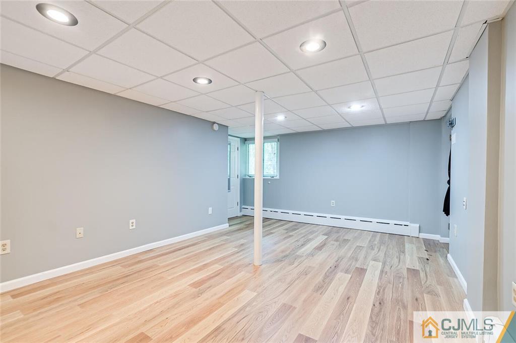 33 Davidson's Mill Road North Brunswick, NJ 08902 - Photo 21 of 58 a view of empty room with wooden floor