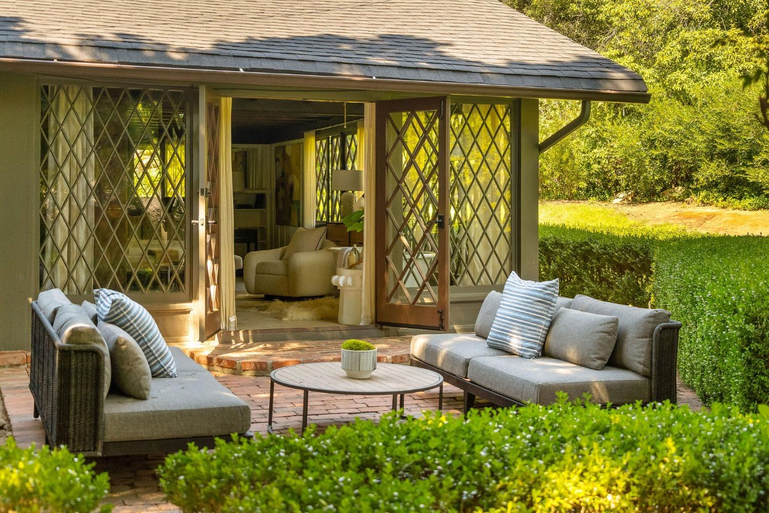 1001 Foothill Road Ojai, CA 93023 - Photo 25 of 50 a outdoor living space with furniture and garden view