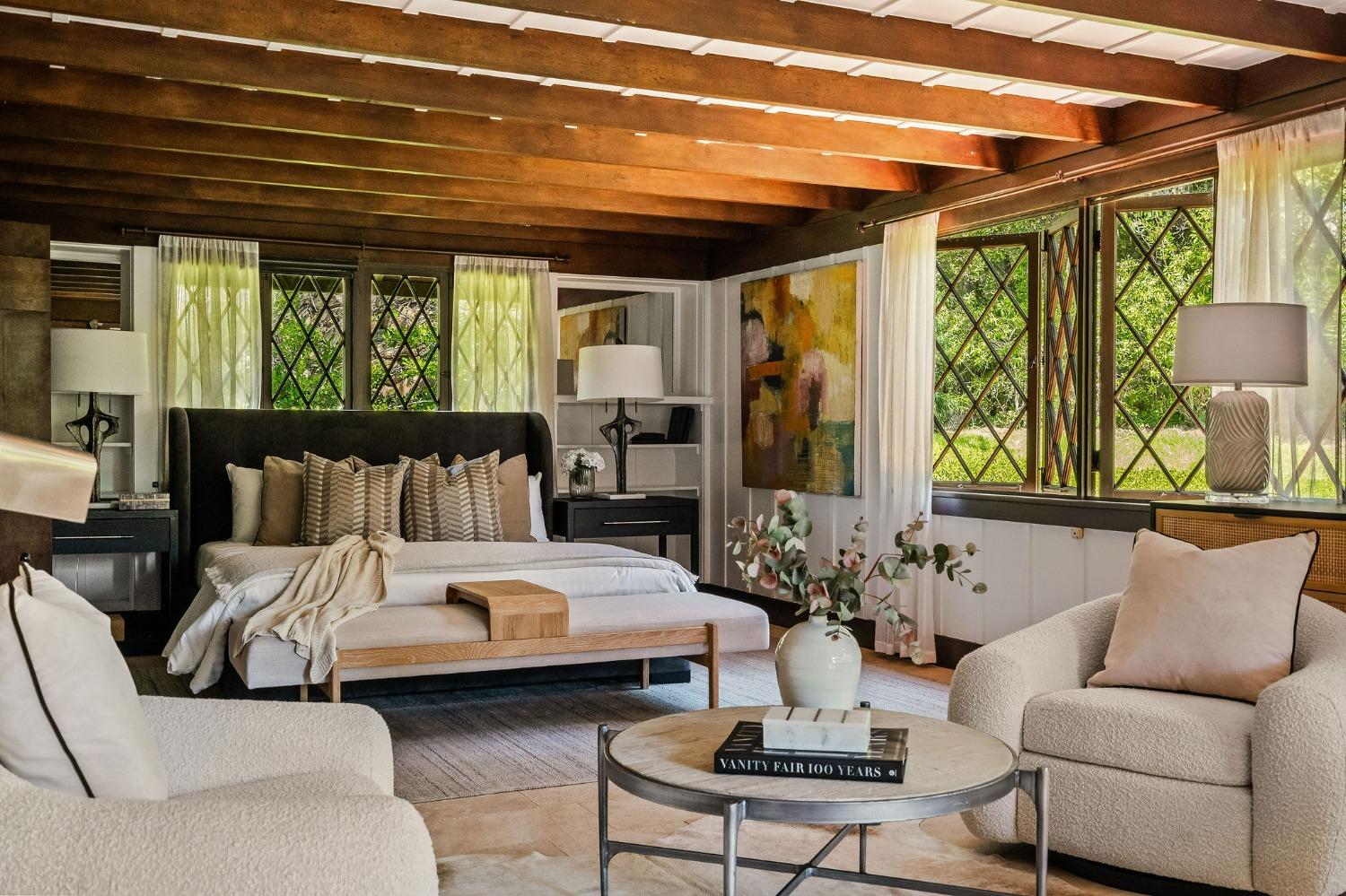 1001 Foothill Road Ojai, CA 93023 - Photo 26 of 50 a bedroom with furniture and a large window