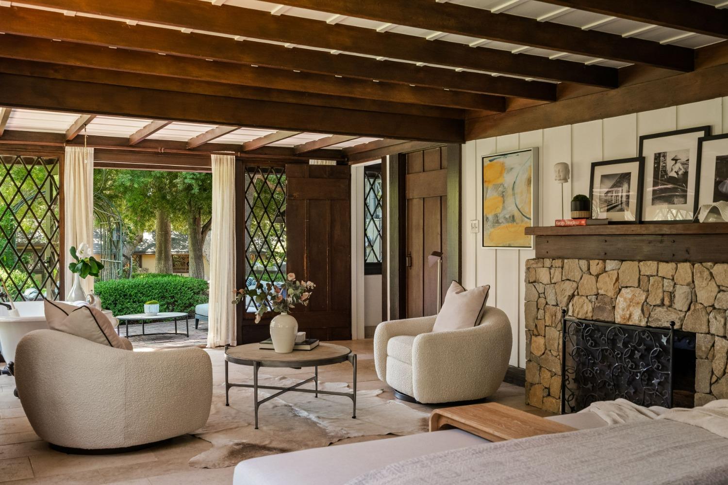 1001 Foothill Road Ojai, CA 93023 - Photo 29 of 50 a living room with furniture and a fireplace