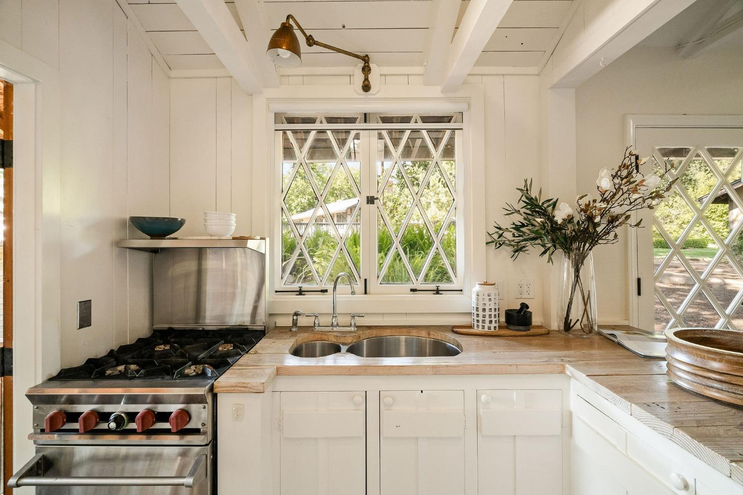 1001 Foothill Road Ojai, CA 93023 - Photo 41 of 50 a kitchen with a stove and a white refrigerator