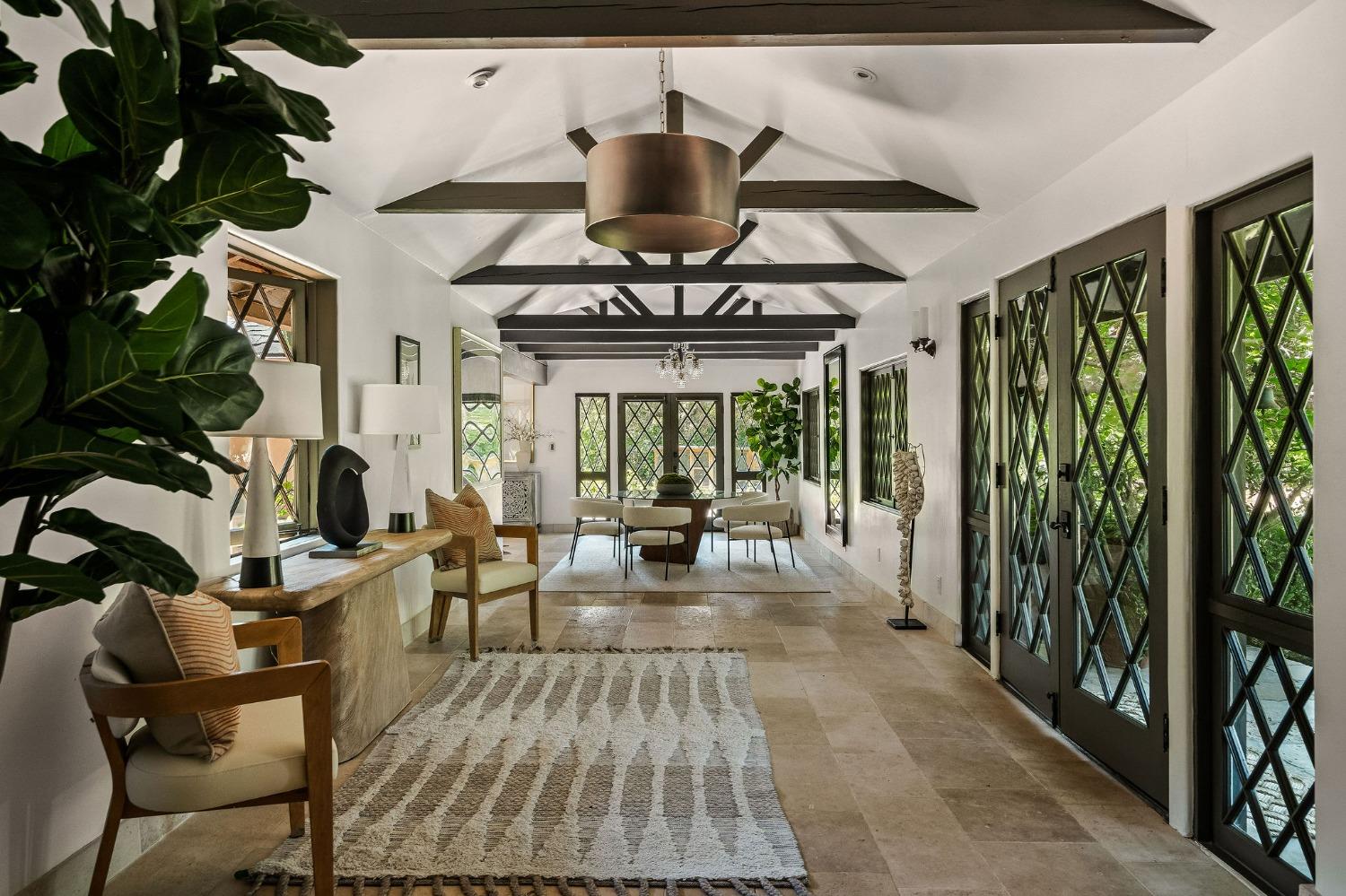 1001 Foothill Road Ojai, CA 93023 - Photo 9 of 50 a very nice looking room with many windows and furniture