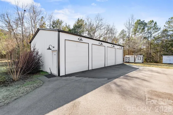 a view of parking garage with cars
