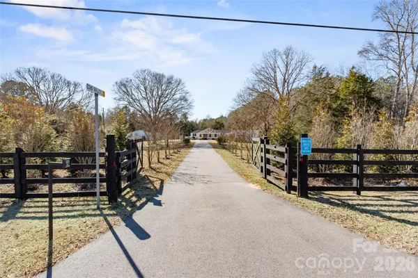 a view of a house with a street