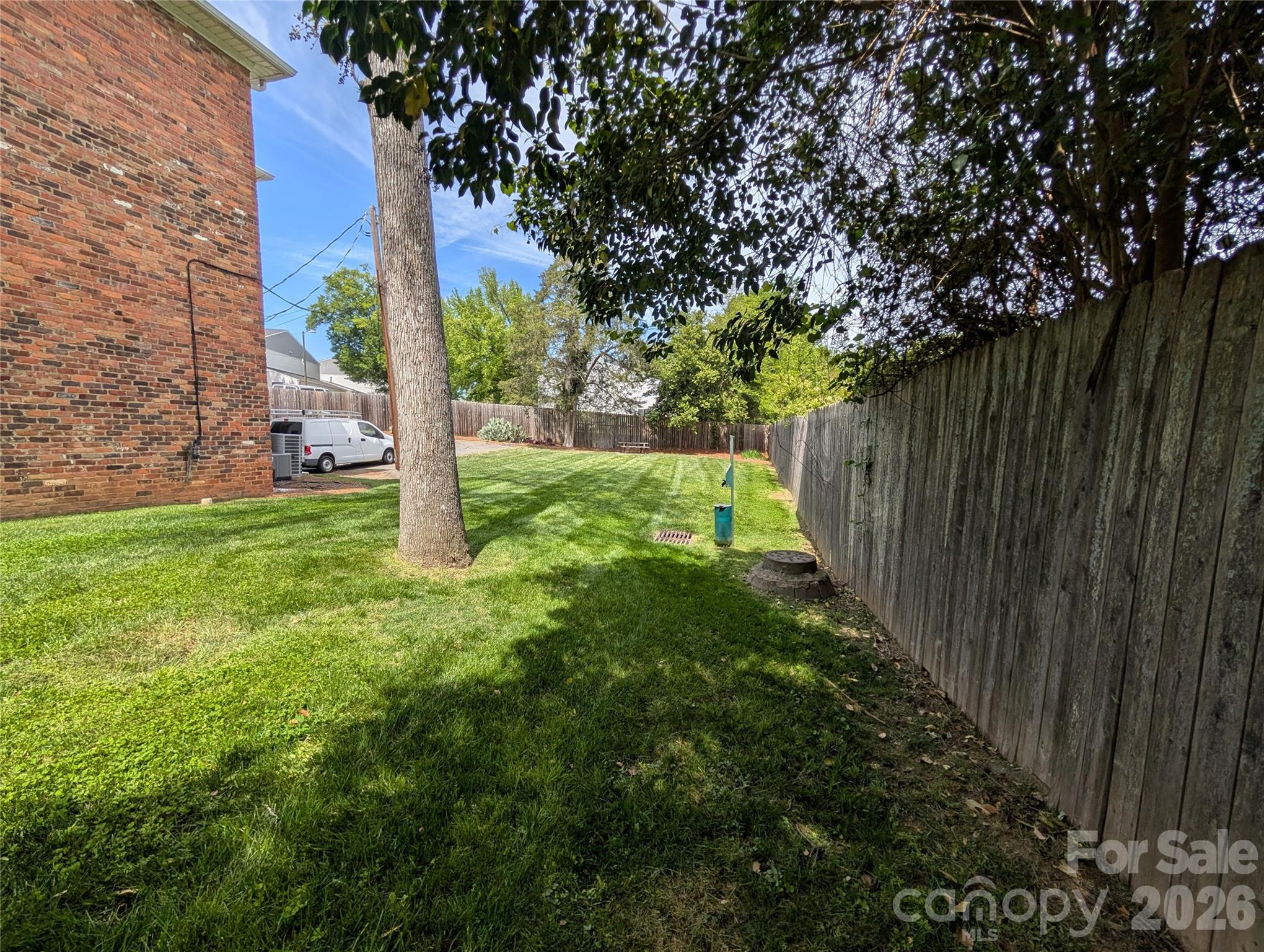 916 McAlway Road, Unit D Charlotte, NC 28211 - Photo 8 of 12 a view of a backyard with pathway