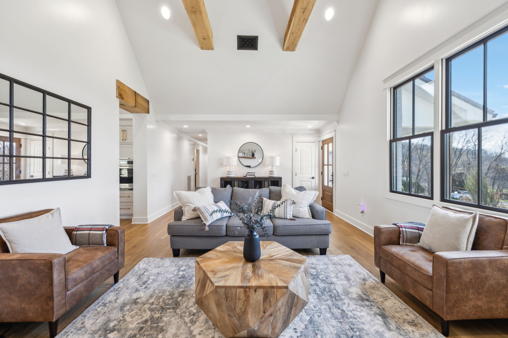 4676 Reed Road Thompson's Station, TN 37179 - Photo 13 of 67 a living room with furniture or couch and a large window