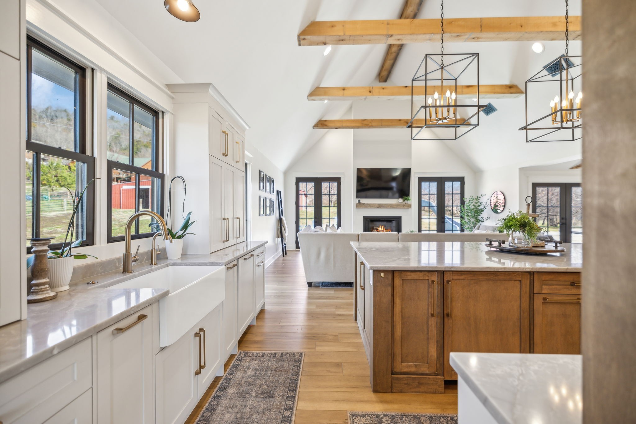 4676 Reed Road Thompson's Station, TN 37179 - Photo 15 of 67 a large white kitchen with a large window