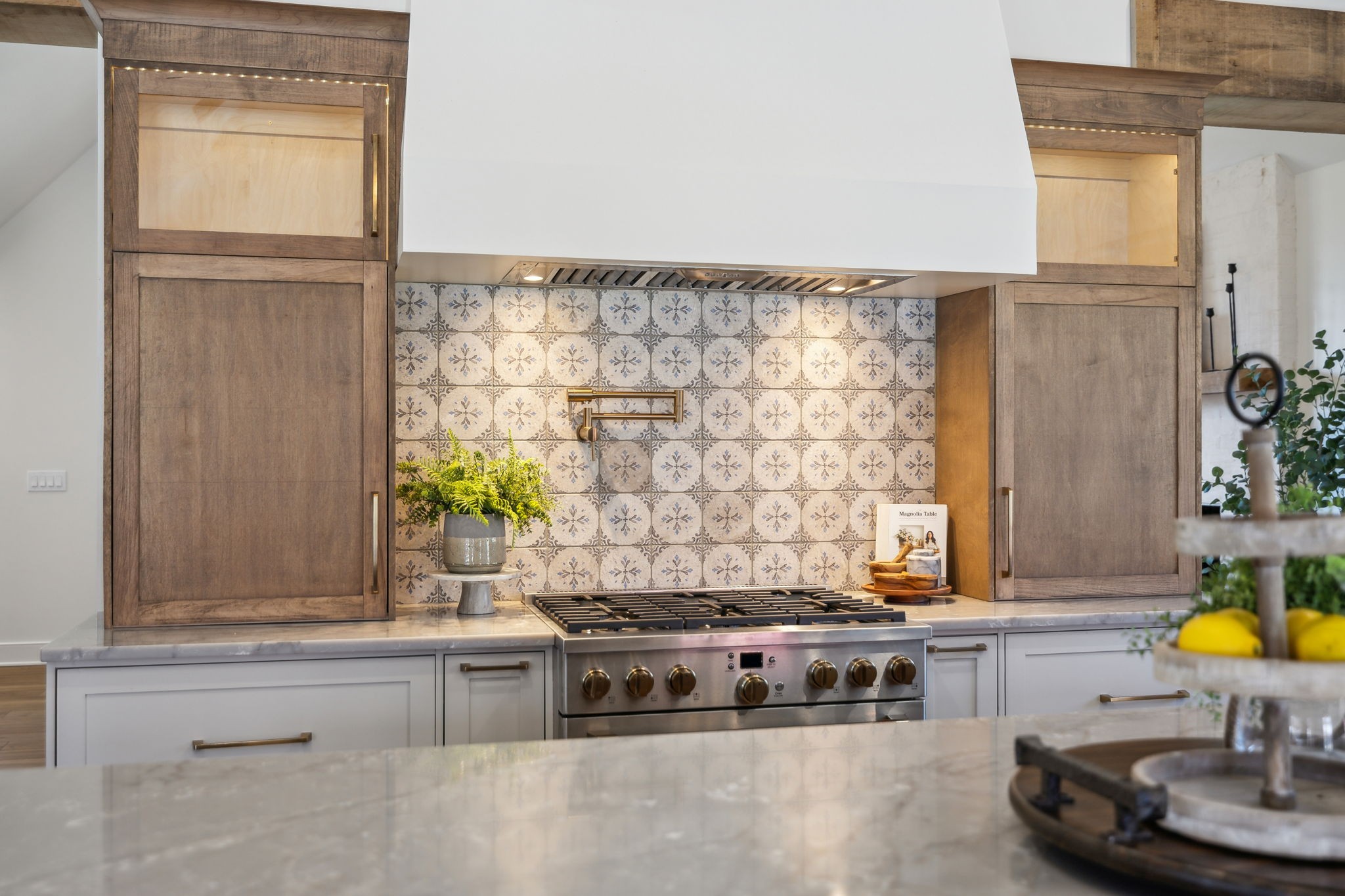 4676 Reed Road Thompson's Station, TN 37179 - Photo 20 of 67 a kitchen with stainless steel appliances granite countertop a sink and a cabinets