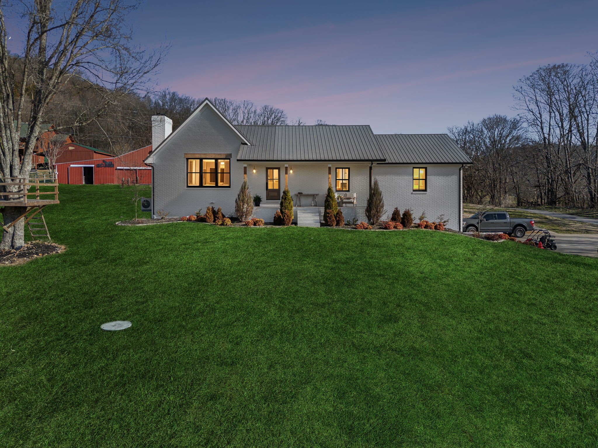 4676 Reed Road Thompson's Station, TN 37179 - Photo 2 of 67 a view of a yard in front of a house