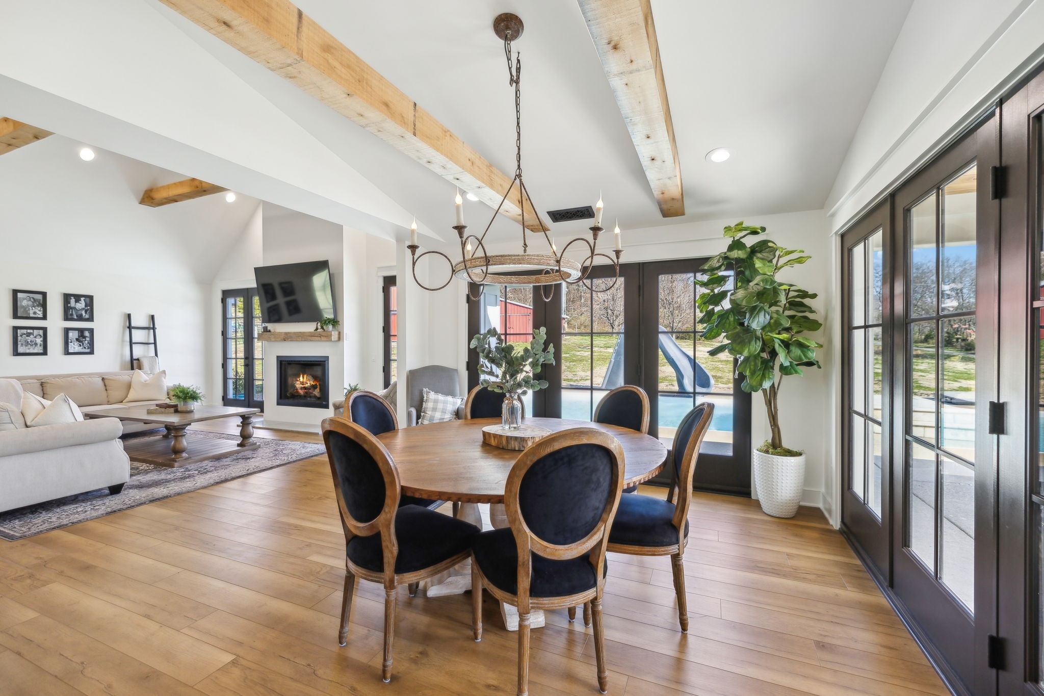 4676 Reed Road Thompson's Station, TN 37179 - Photo 28 of 67 a view of a dining room with furniture window and wooden floor