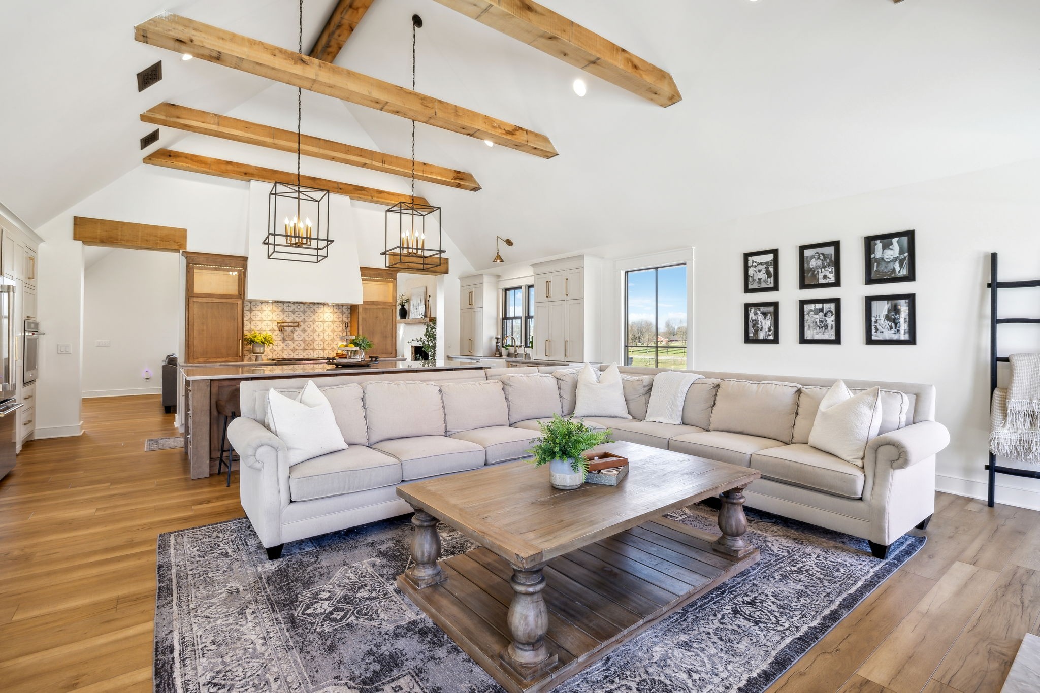 4676 Reed Road Thompson's Station, TN 37179 - Photo 32 of 67 a living room with furniture and a table