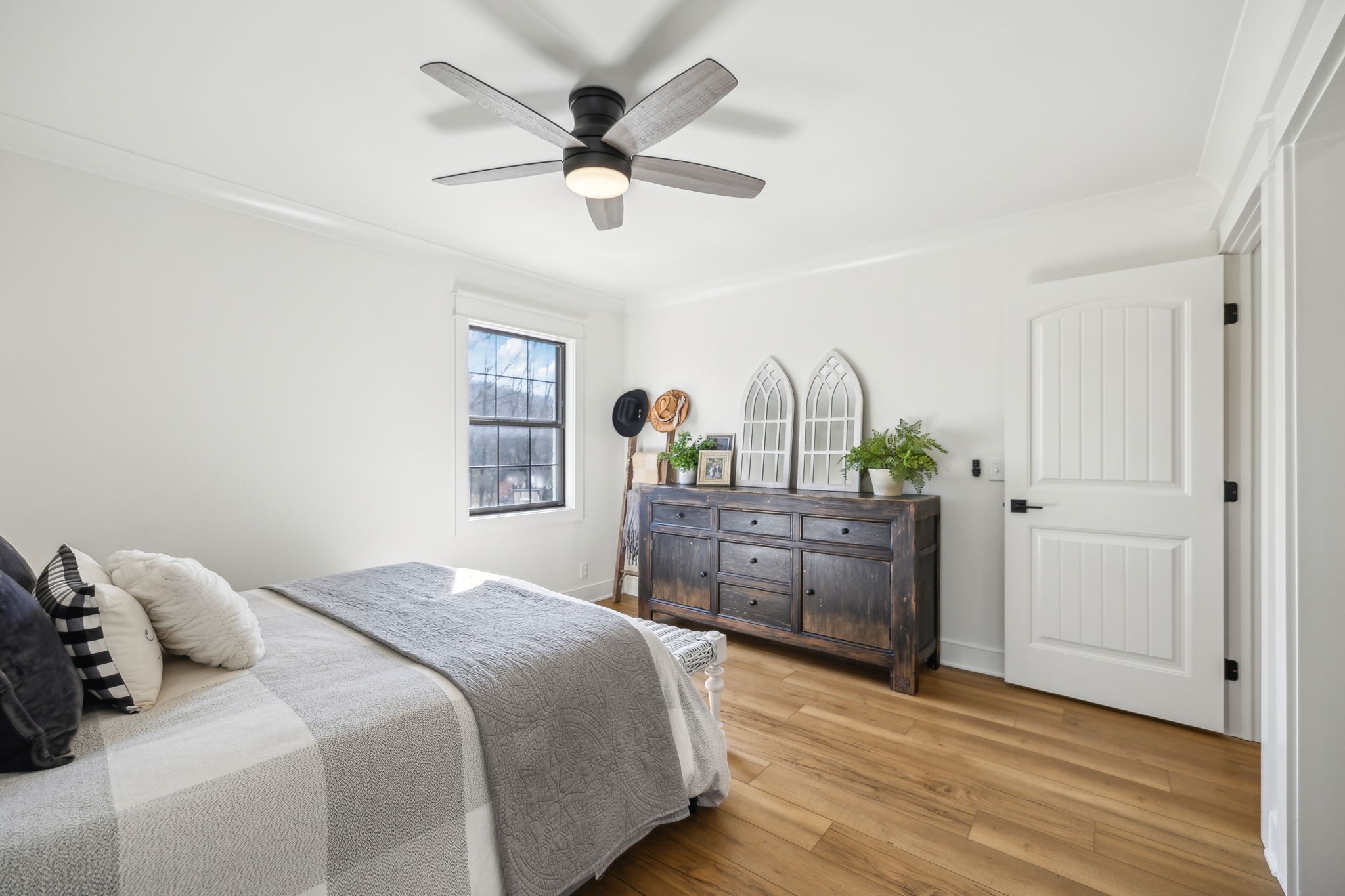 4676 Reed Road Thompson's Station, TN 37179 - Photo 44 of 67 a bedroom with a bed and a dresser