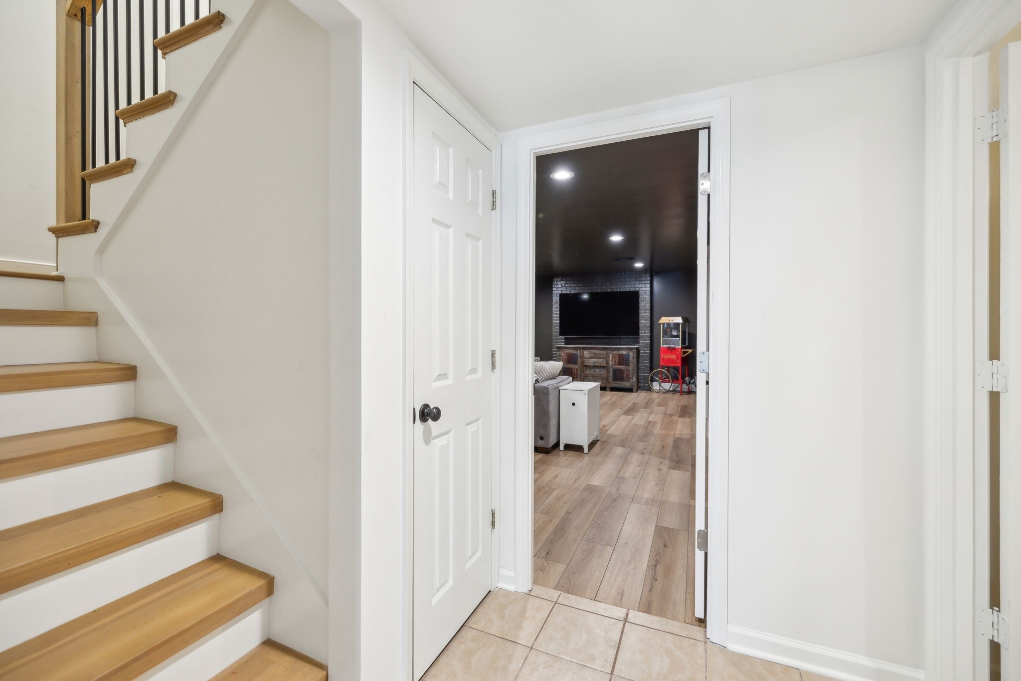 4676 Reed Road Thompson's Station, TN 37179 - Photo 46 of 67 a view of a hallway with wooden floor and staircase