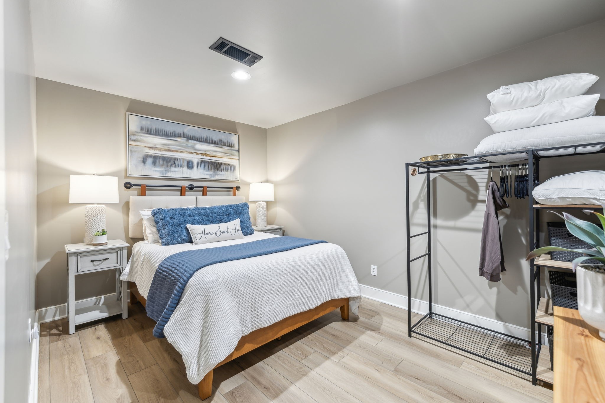 4676 Reed Road Thompson's Station, TN 37179 - Photo 50 of 67 a bedroom with a bed and wooden floor