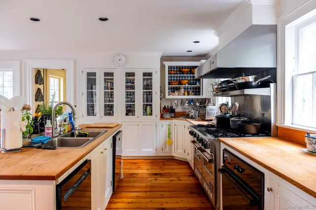 a view of a dining room with furniture and window