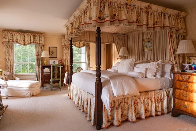 a view of a dining room with furniture and a fireplace