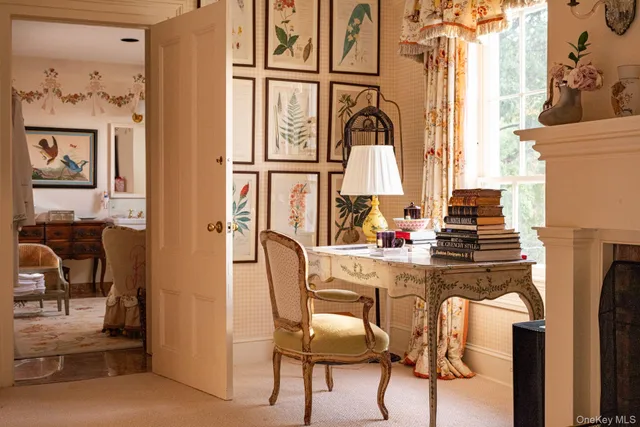 a view of a hallway with windows and couch