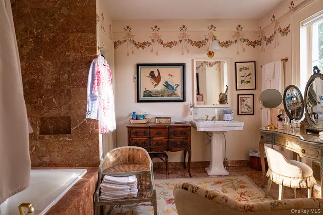 a view of entryway with wooden floor and stairs