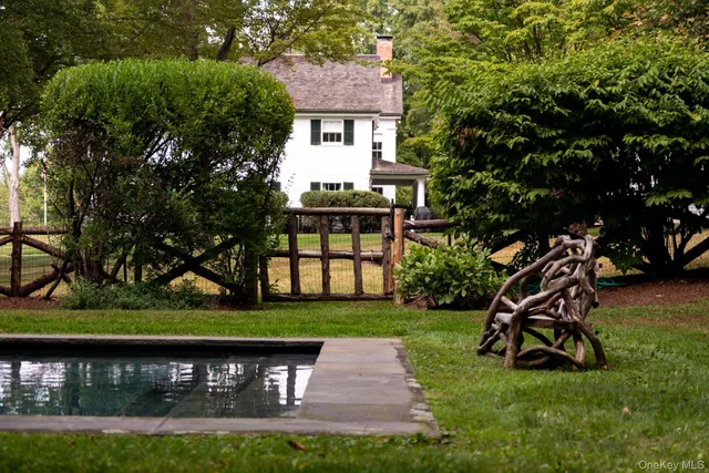 a view of a with large trees