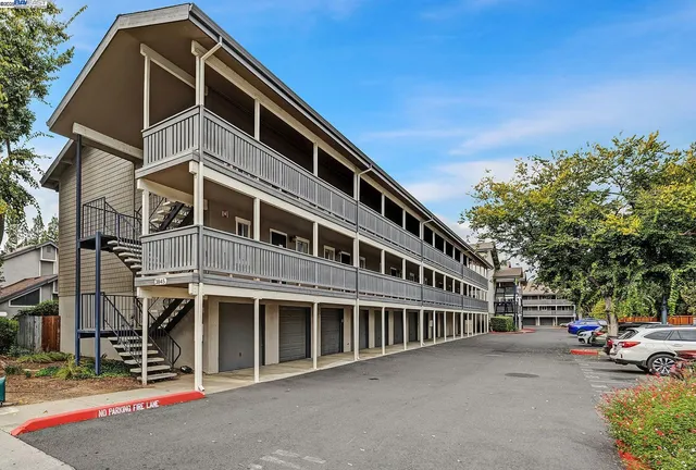 a front view of a building with street view