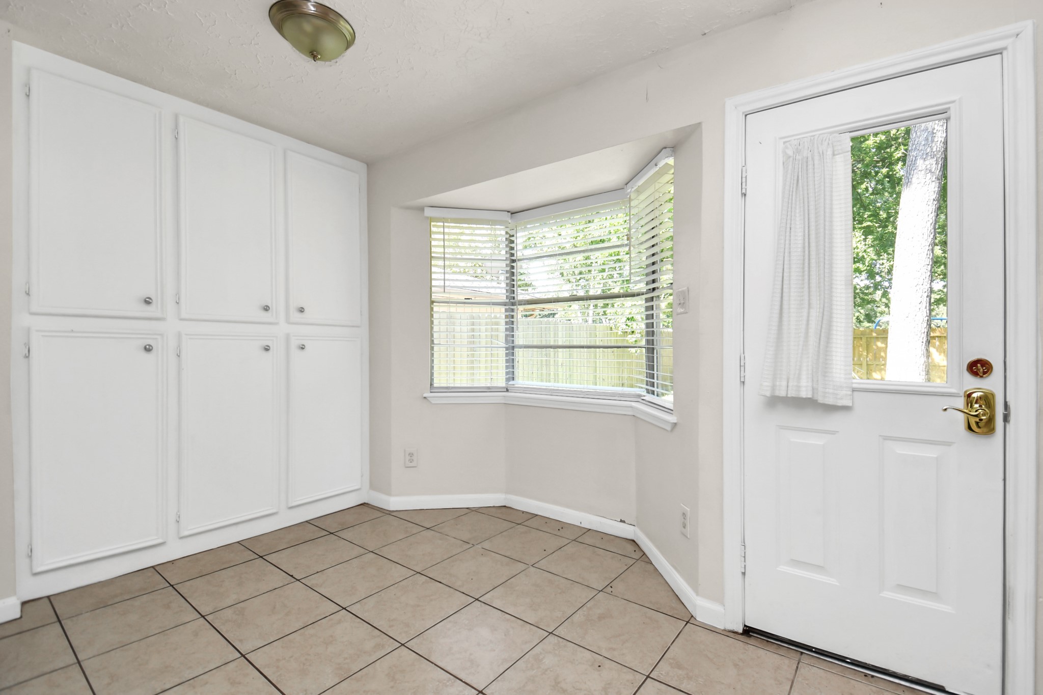 18023 Woodgum Drive Spring, TX 77388 - Photo 15 of 38 a view of an empty room and window
