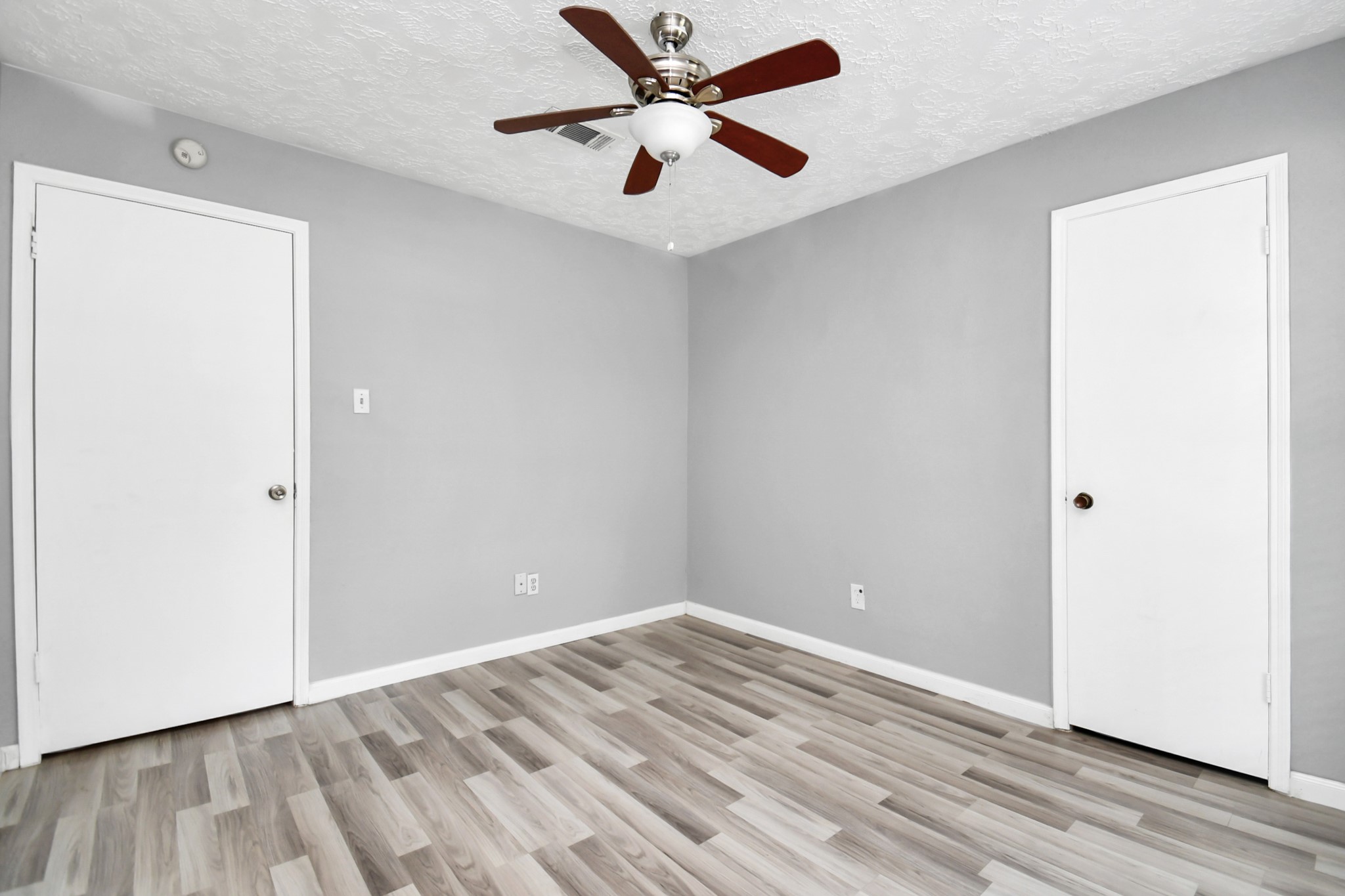 18023 Woodgum Drive Spring, TX 77388 - Photo 29 of 38 a view of empty room with wooden floor