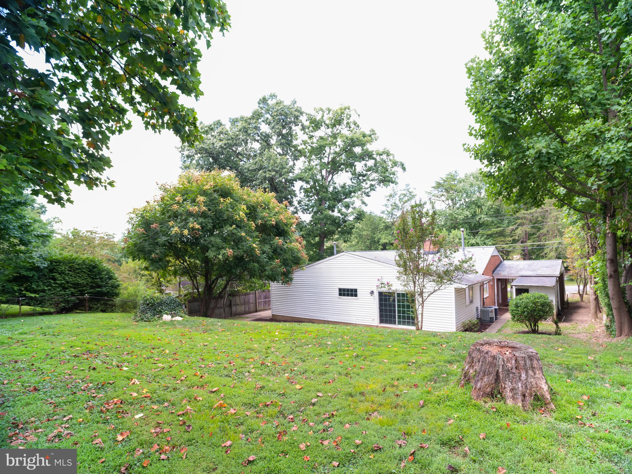 7319 Monticello Boulevard Springfield, VA 22150 - Photo 15 of 27 a aerial view of a house with backyard and a garden