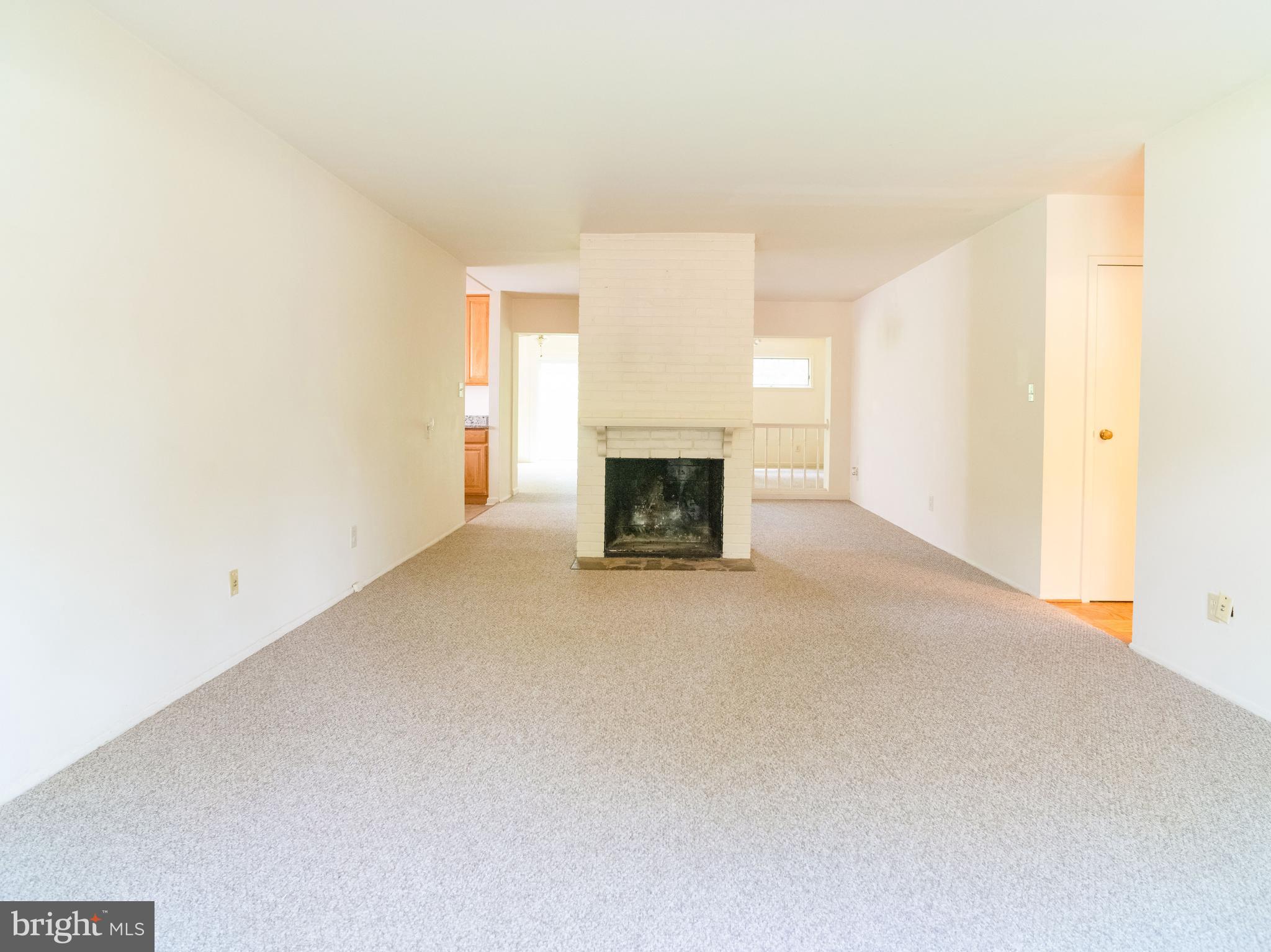 7319 Monticello Boulevard Springfield, VA 22150 - Photo 17 of 27 a view of a livingroom with a fireplace