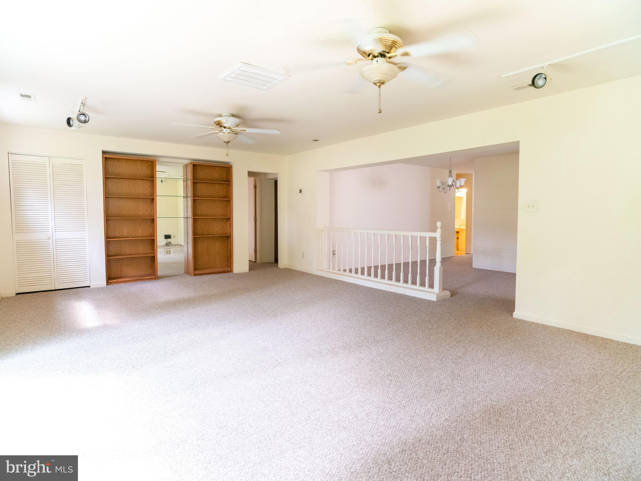 7319 Monticello Boulevard Springfield, VA 22150 - Photo 20 of 27 a view of an empty room with a ceiling fan