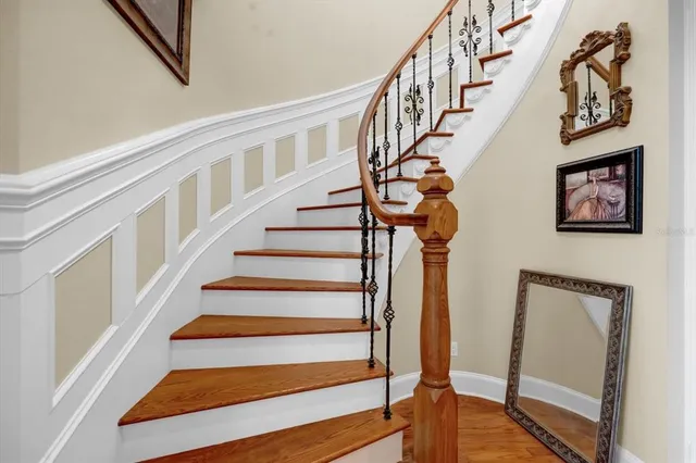 a view of an empty room with a window and outside view