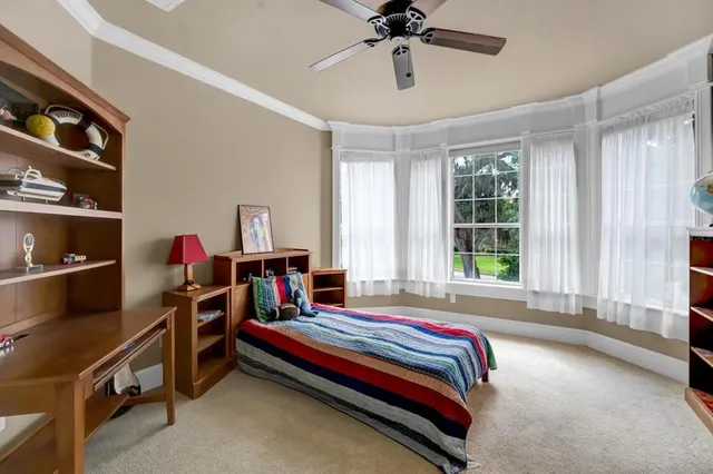 a view of staircase with white walls and a window