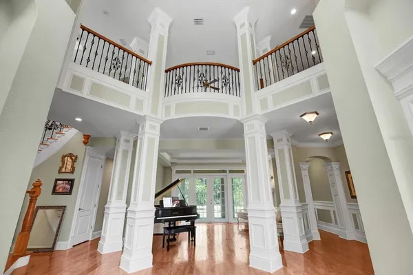 a kitchen with a sink stove and white cabinets