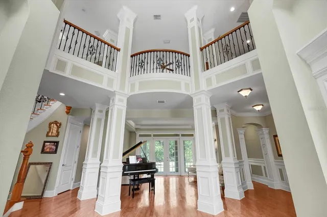 a kitchen with a sink stove and white cabinets