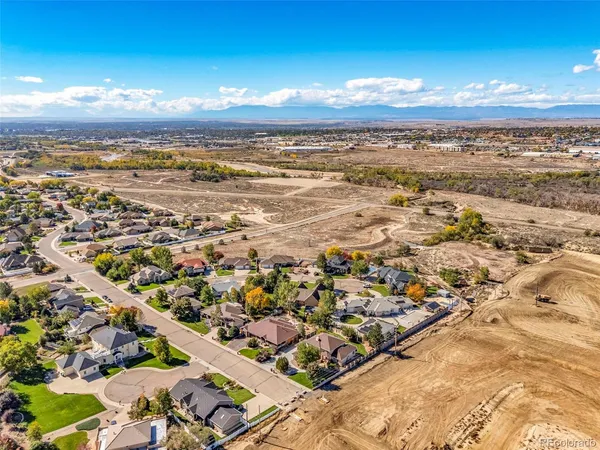 a kitchen with a sink and a large window