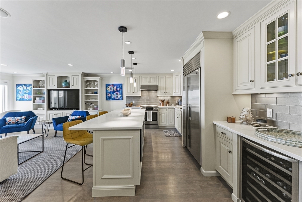 64 Cliffside Drive, Unit 64 Plymouth, MA 02360 - Photo 11 of 42 a kitchen that has a lot of cabinets in it and appliances