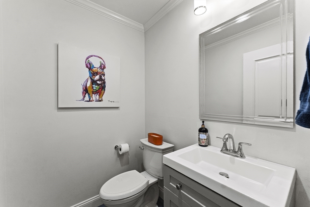 64 Cliffside Drive, Unit 64 Plymouth, MA 02360 - Photo 19 of 42 a bathroom with a sink mirror and toilet