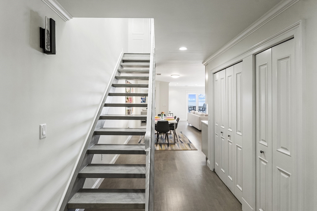 64 Cliffside Drive, Unit 64 Plymouth, MA 02360 - Photo 25 of 42 a view of entryway and hall with wooden floor