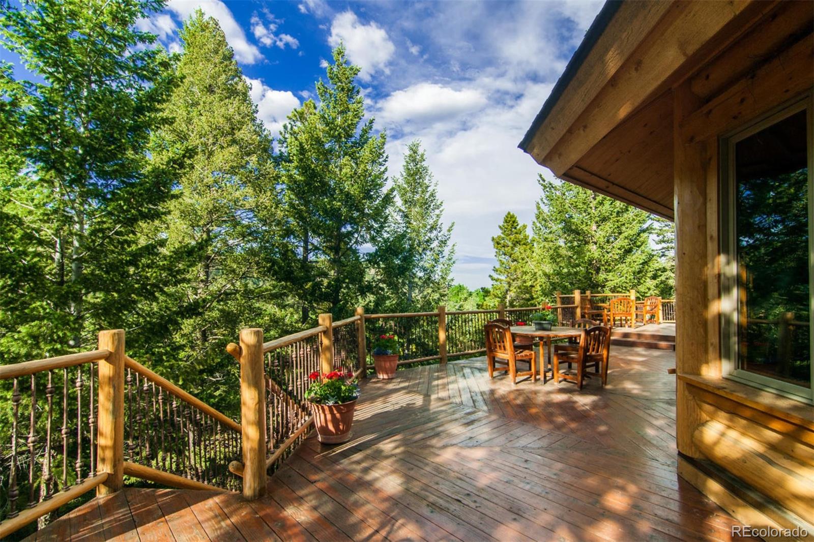 590 West Meadow Road Evergreen, CO 80439 - Photo 34 of 40 a view of outdoor space with seating