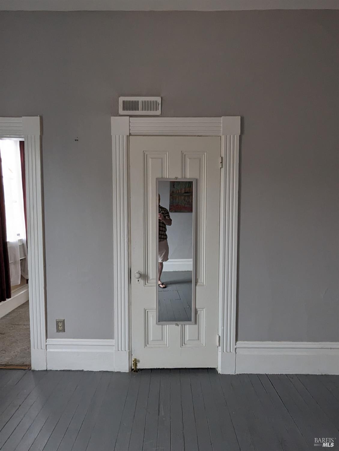 1547 4th Street, Unit A San Rafael, CA 94901 - Photo 43 of 64 a view of a small space with wooden floor and closet