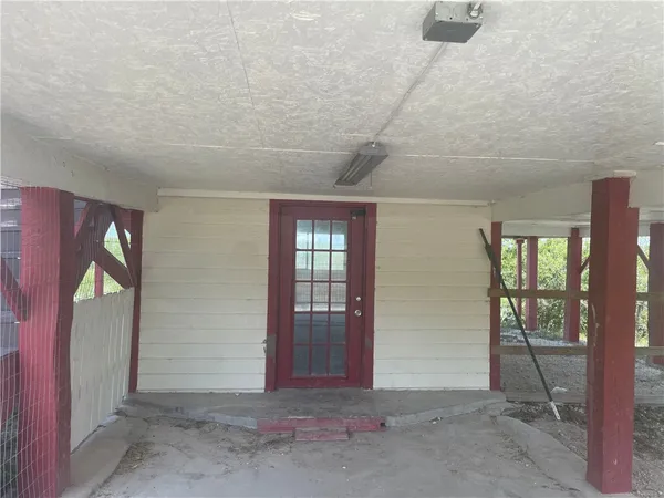 a view of a cafe with sitting area
