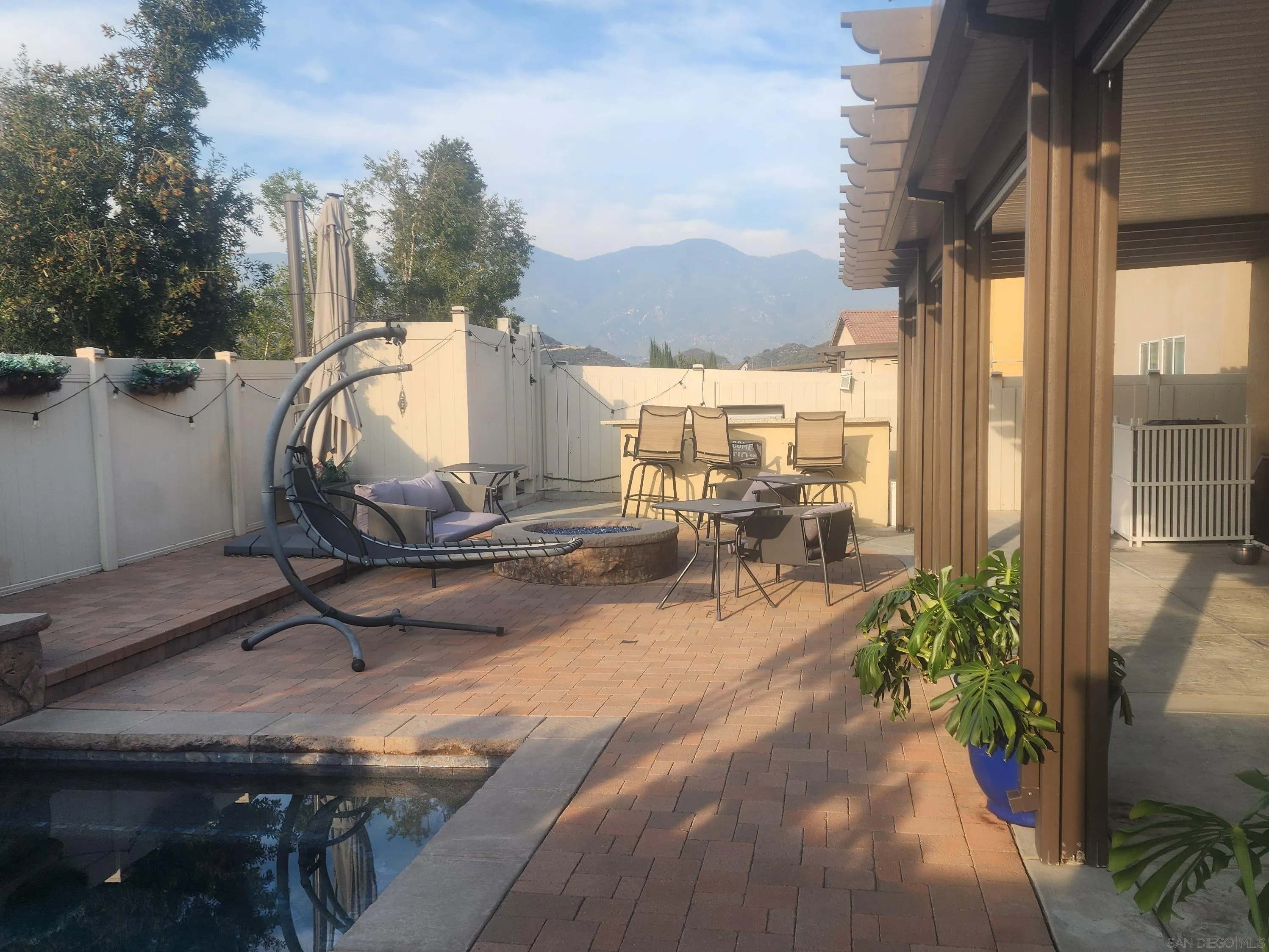 3326 Crowfoot Road San Bernardino, CA 92407 - Photo 16 of 20 a view of a backyard with sitting area