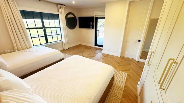 a view of a backyard with sitting area