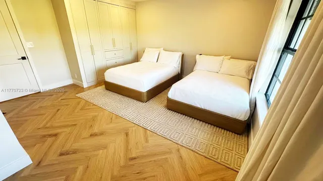 a view of a house with backyard and porch