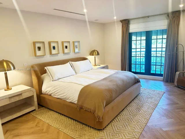 an aerial view of a house with outdoor space