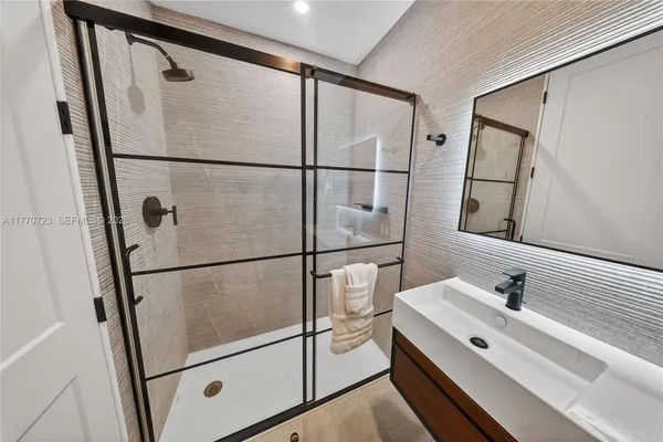 a view of a chairs and table in a patio