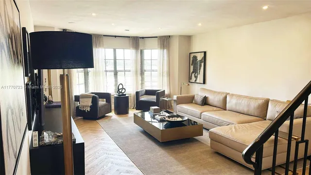 a kitchen with stainless steel appliances a refrigerator and sink